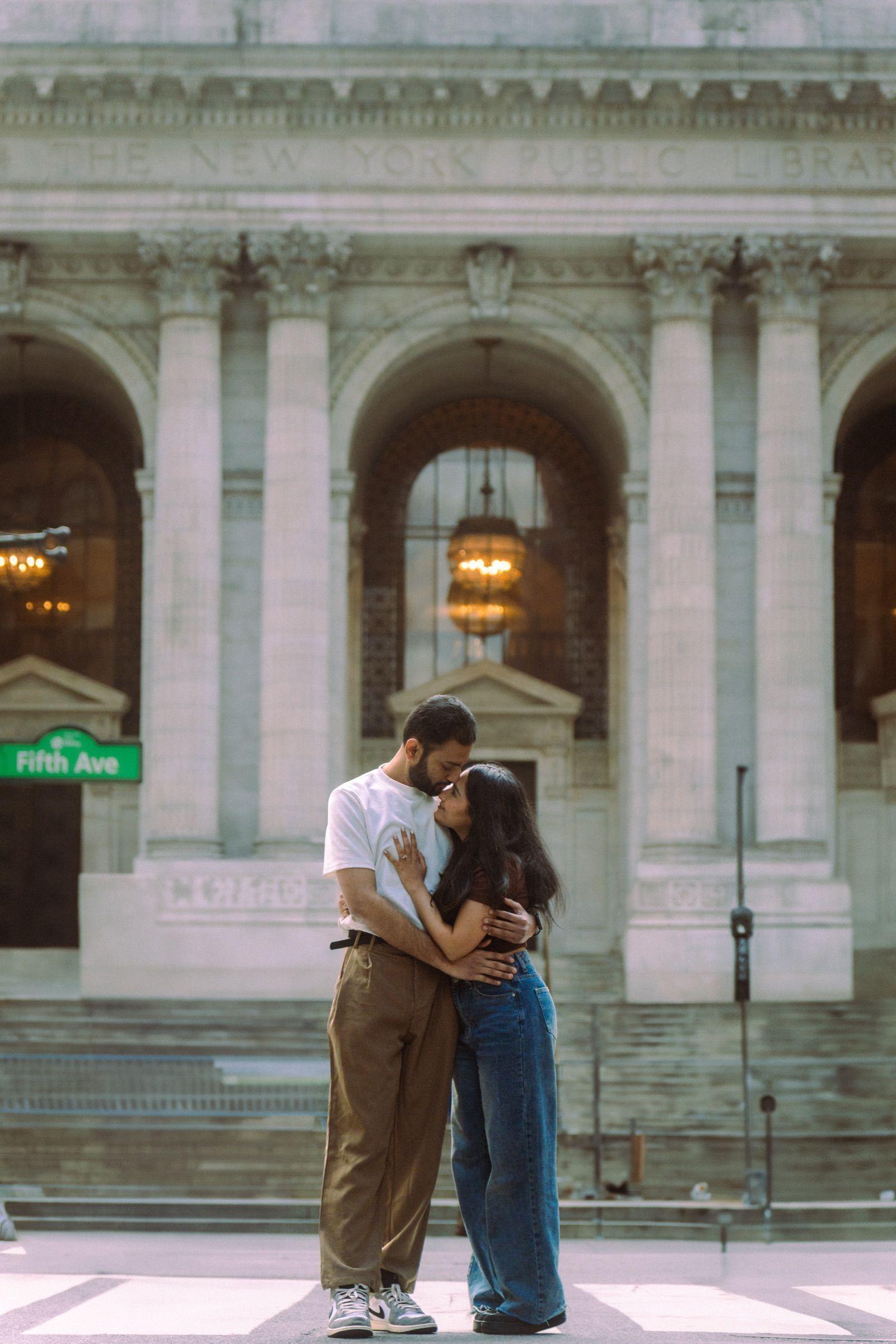 Couple embraces in a sunlit park, photography by Aakaara Studios.